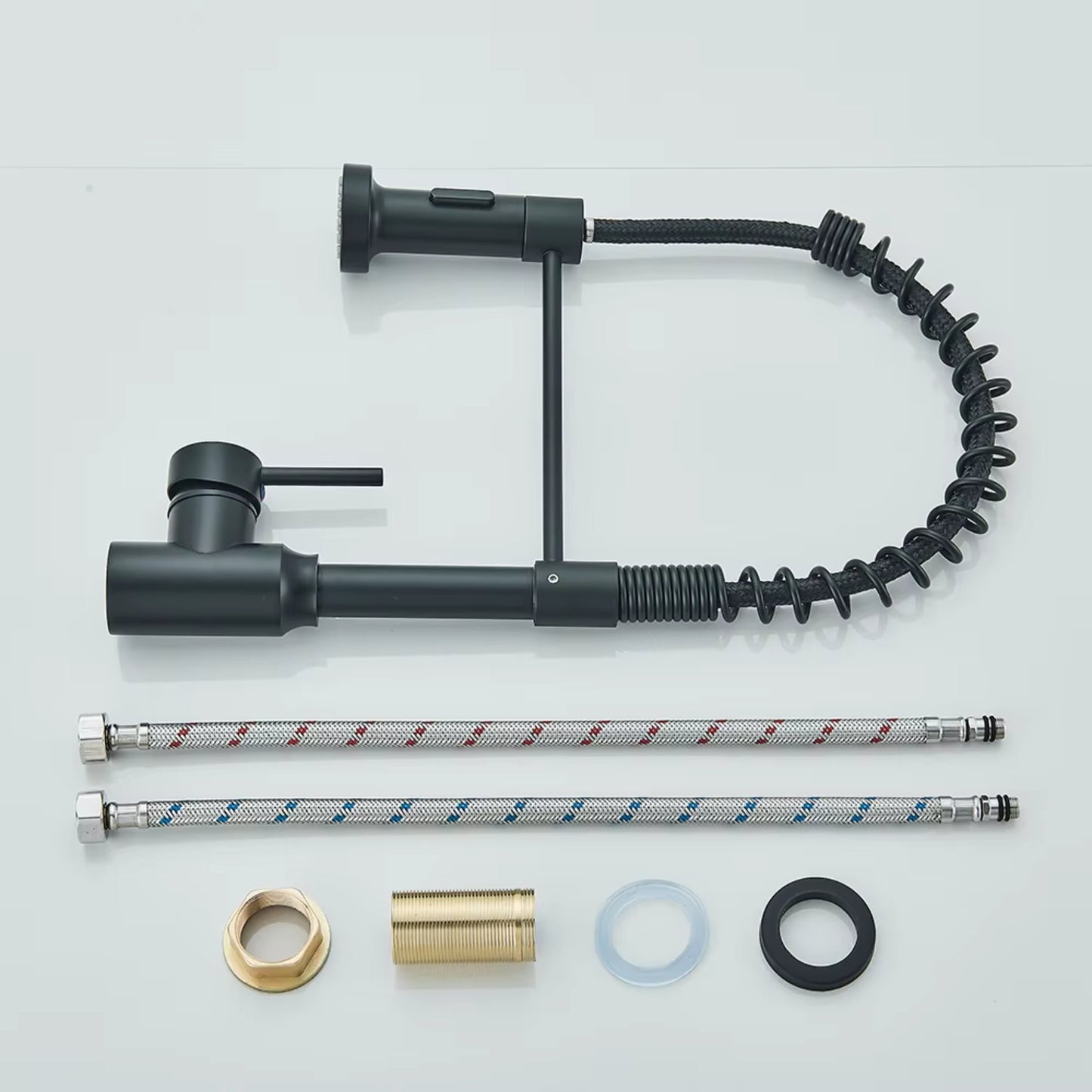 Components of a matte black pull-down kitchen faucet, including hoses, mounting hardware, and detachable spray head.